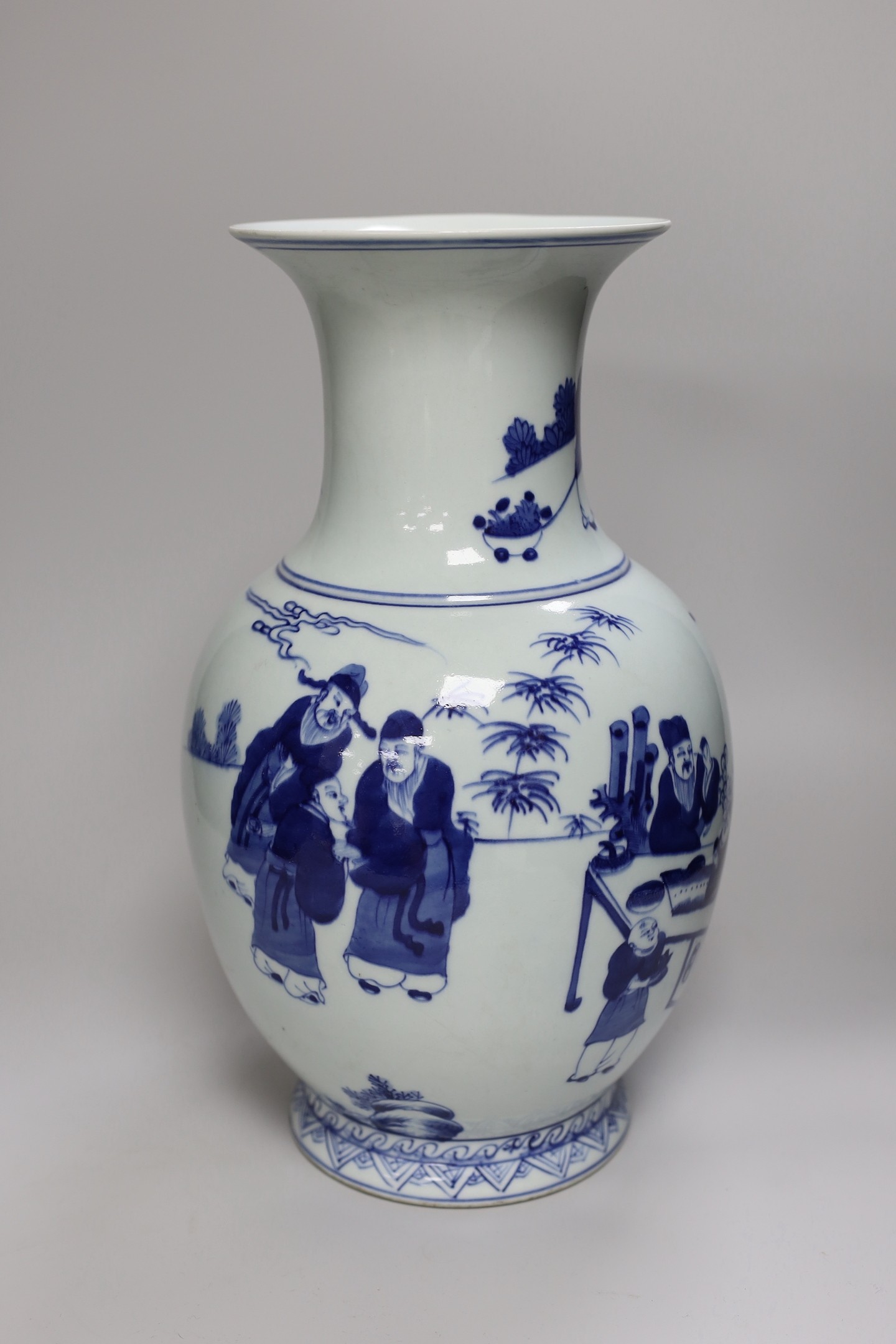 A Chinese blue and white 'scholar's' vase, early 20th century. 37cm high
